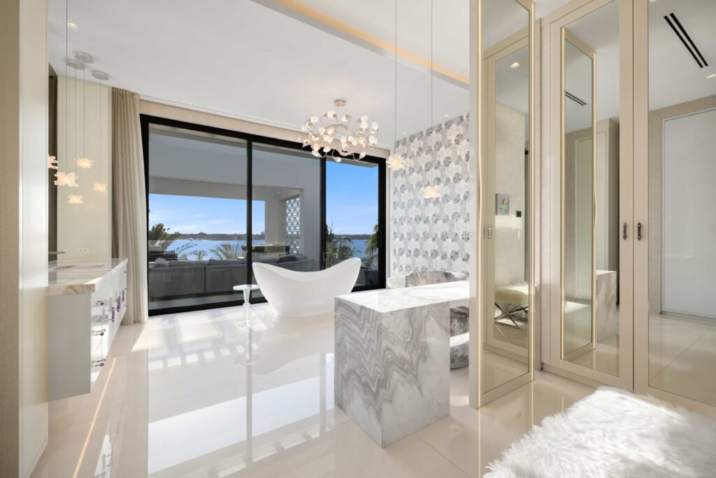 Custom-built mega mansion in Manalapan, FL hits market for $85M with bowling alleys, a private beach tunnel, wine cellar, and ocean views from a 150-foot balcony.